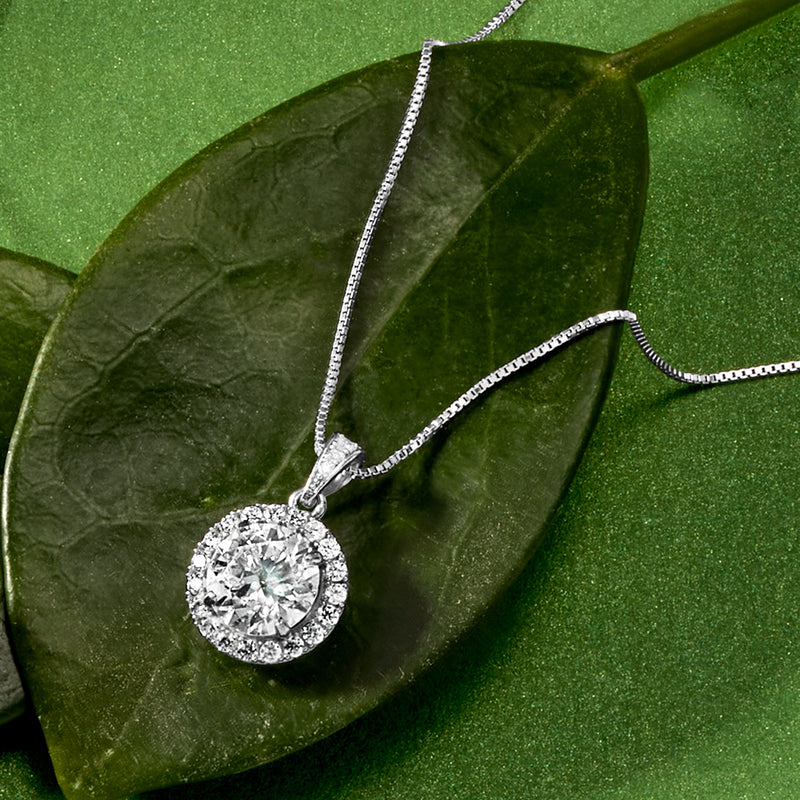 Sterling silver moissanite pendant necklace with round halo setting and link chain