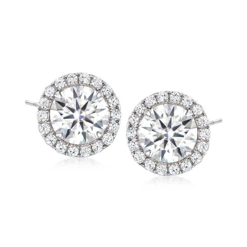 Sterling silver moissanite stud earrings with round halo and post backs, clear stones