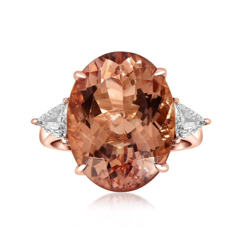 Rose gold oval morganite ring with diamond side accents and prong setting