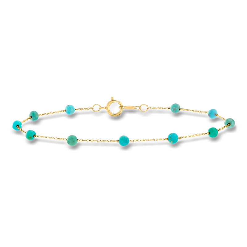 Turquoise bead station bracelet in 14kt yellow gold with round beads and spring-ring clasp
