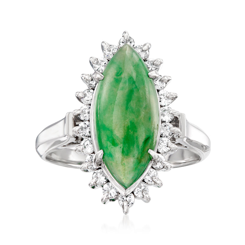 Platinum vintage ring with oval green jade center and diamond halo