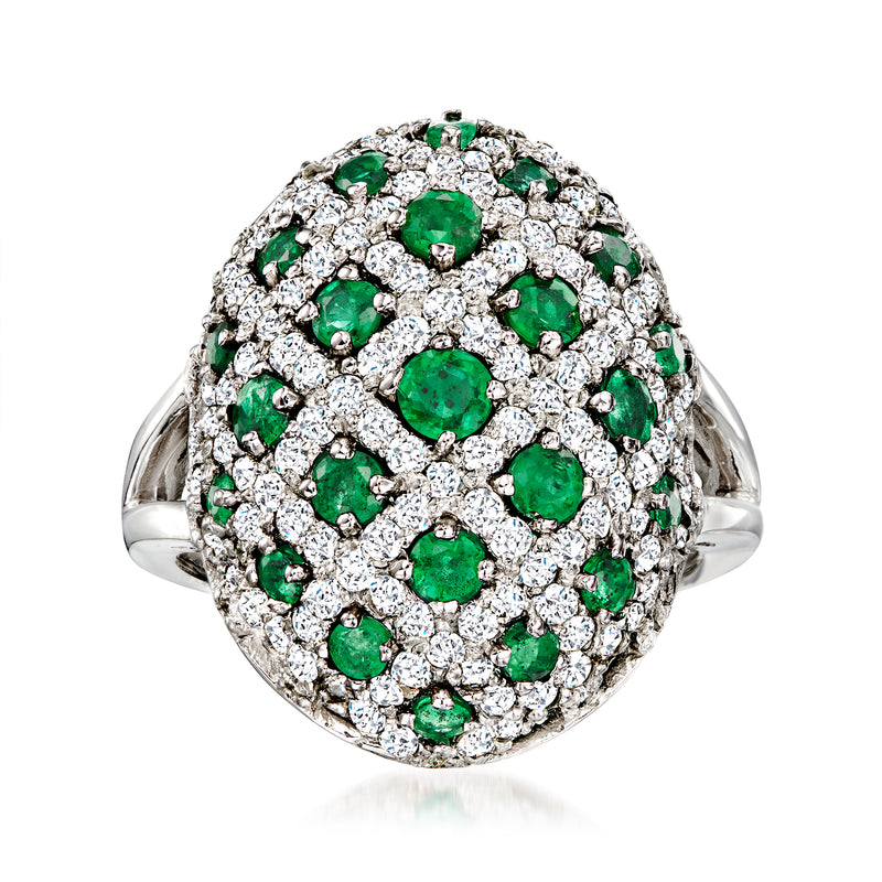 14kt white gold dome ring with green emeralds and white diamond halo settings.