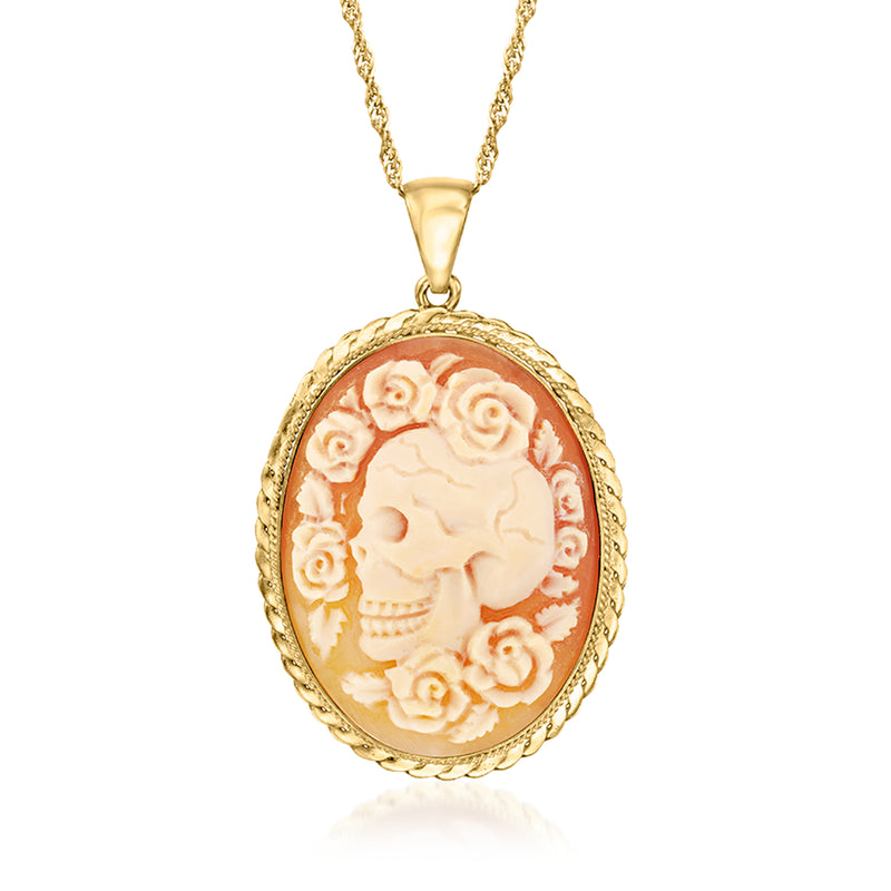 Gold cameo pendant necklace with orange shell skull and floral frame