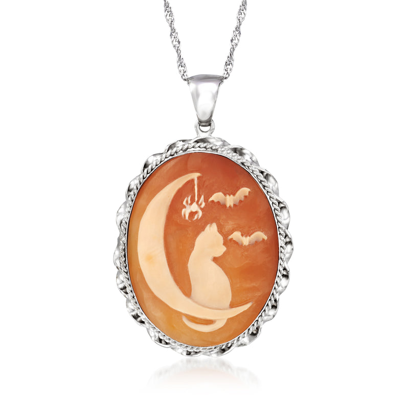 Sterling silver cameo pendant with orange cat and moon motif in oval bezel
