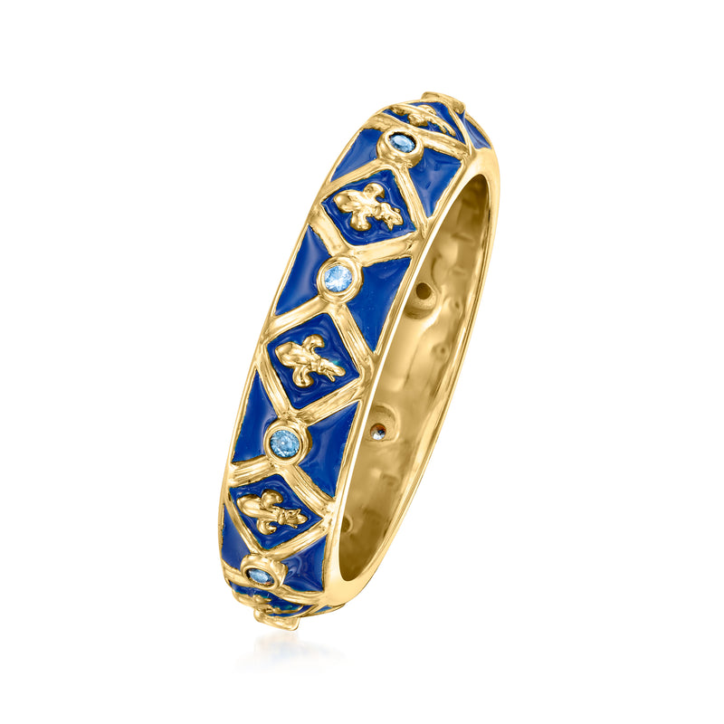 Side view fleur-de-lis enamel ring with blue panels, clear stones, gold-toned band