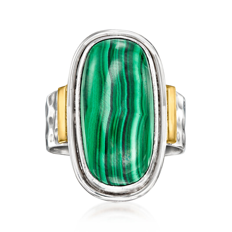Two-tone sterling silver ring with oval green malachite cabochon and gold side accents
