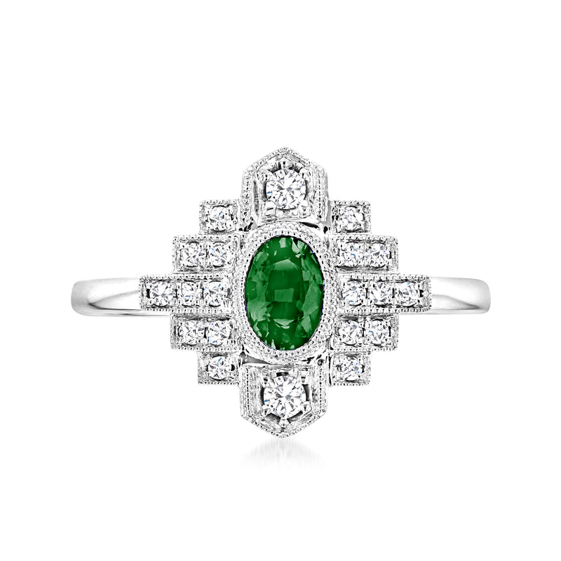 Vintage-style ring with oval green center stone, diamond halo and side accents, 14kt white gold