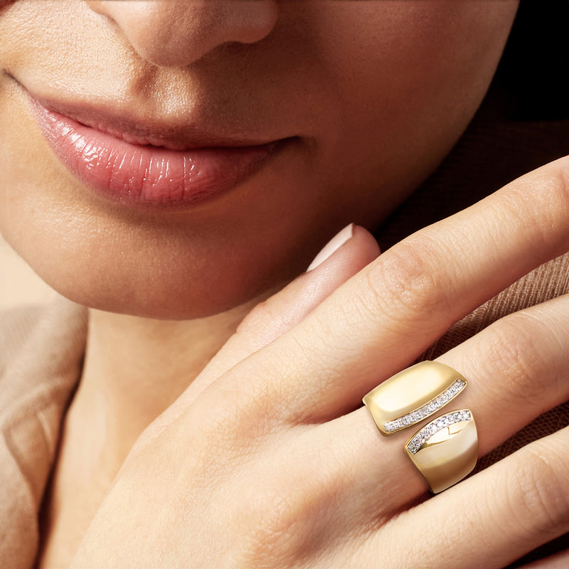 Asymmetrical diamond ring in 18kt gold over sterling on a hand