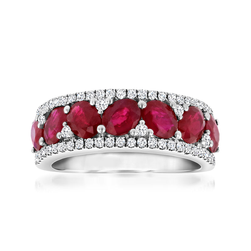 18kt white gold ring with oval red rubies and round diamonds along the band