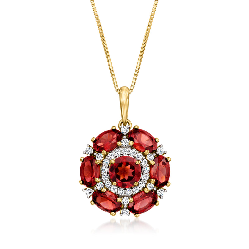 Gold pendant necklace with oval garnet floral cluster and small diamond accents