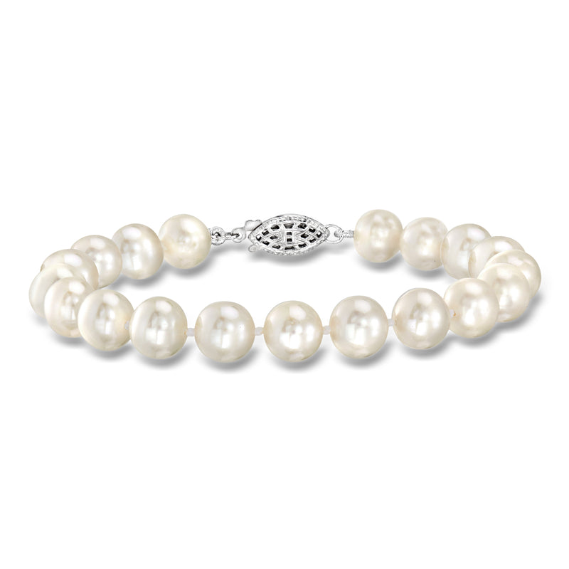 Cultured pearl bracelet with sterling silver clasp and round pearl bead strands