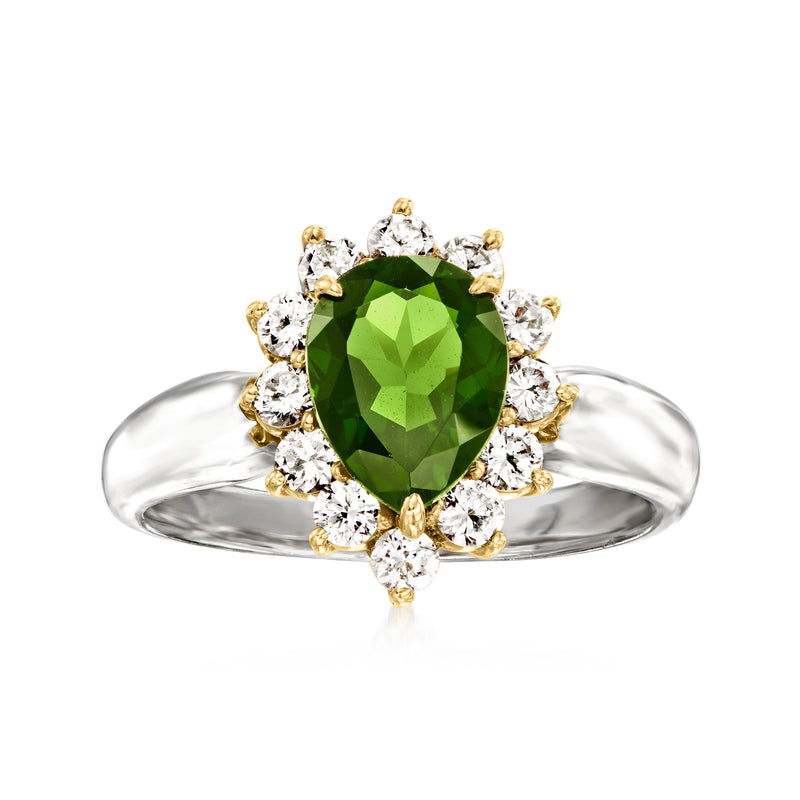 Green tourmaline oval halo ring with diamond accents in platinum and 18kt yellow gold