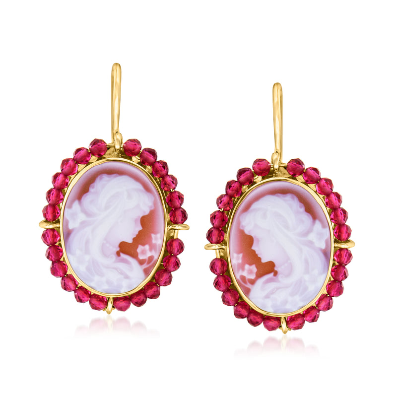 18kt gold cameo drop earrings with oval orange agate cameo and red spinel bead halo
