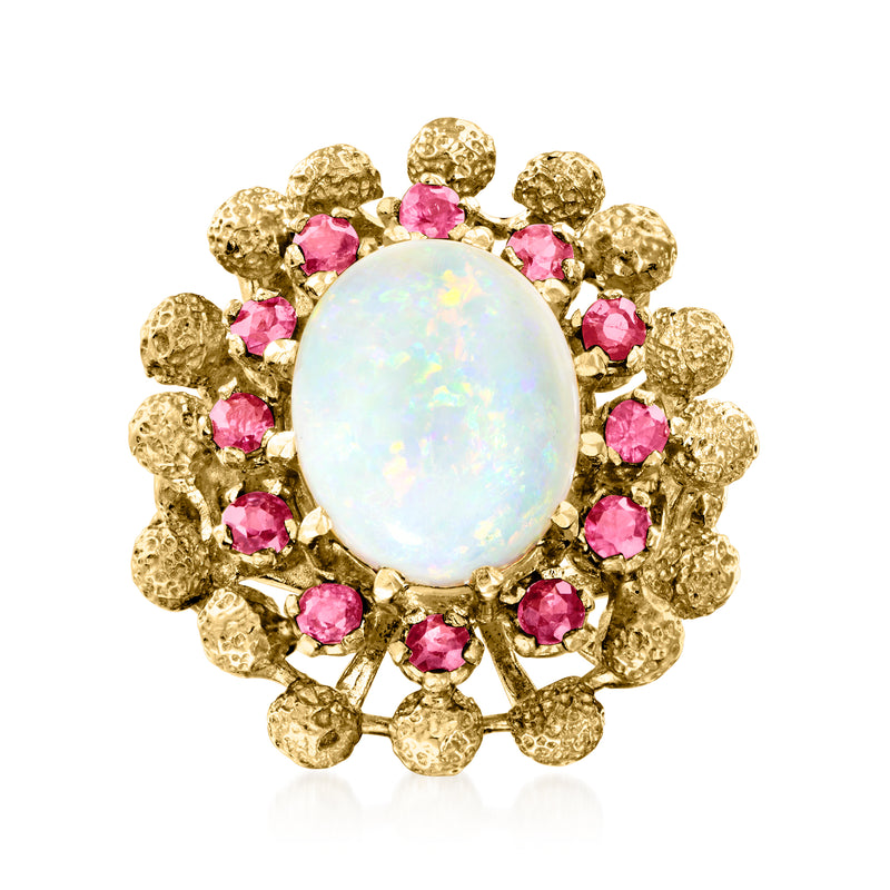 14kt yellow gold opal oval ring with pink ruby halo
