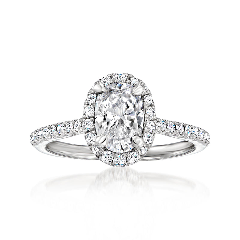14kt white gold diamond engagement ring setting with oval halo and round side diamonds