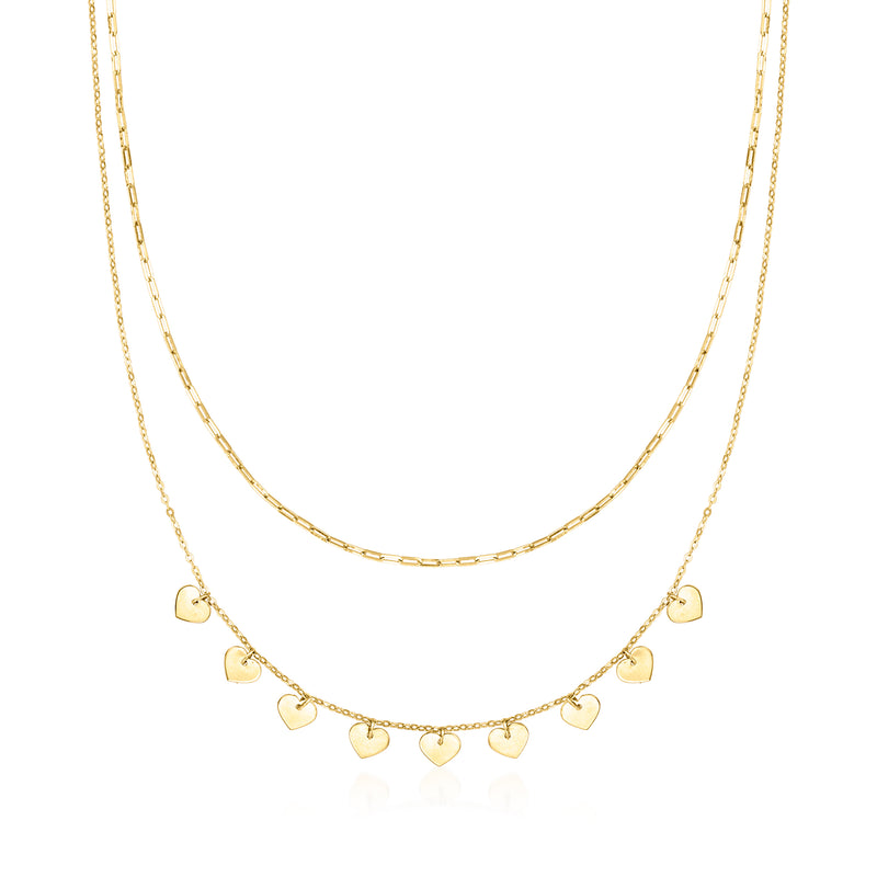 14kt yellow gold layered necklace with paper clip links and small heart charms