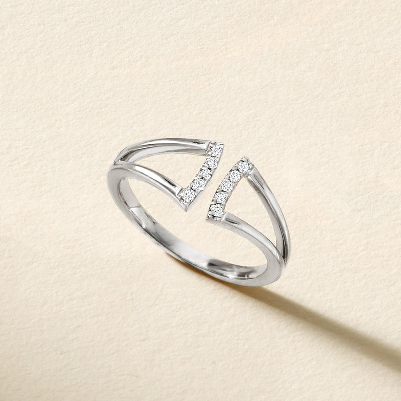 Sterling silver open-space diamond ring top view with two V-shaped stone rows