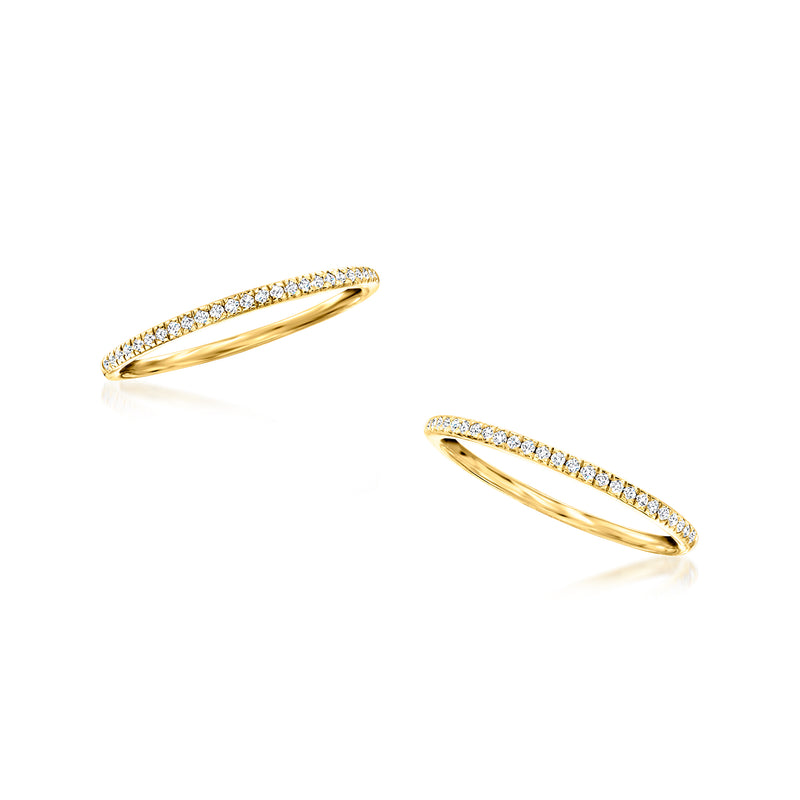 Two stackable yellow gold diamond rings