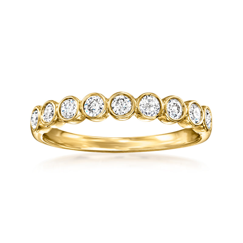 18kt yellow gold bezel-set diamond ring with round stones across the top