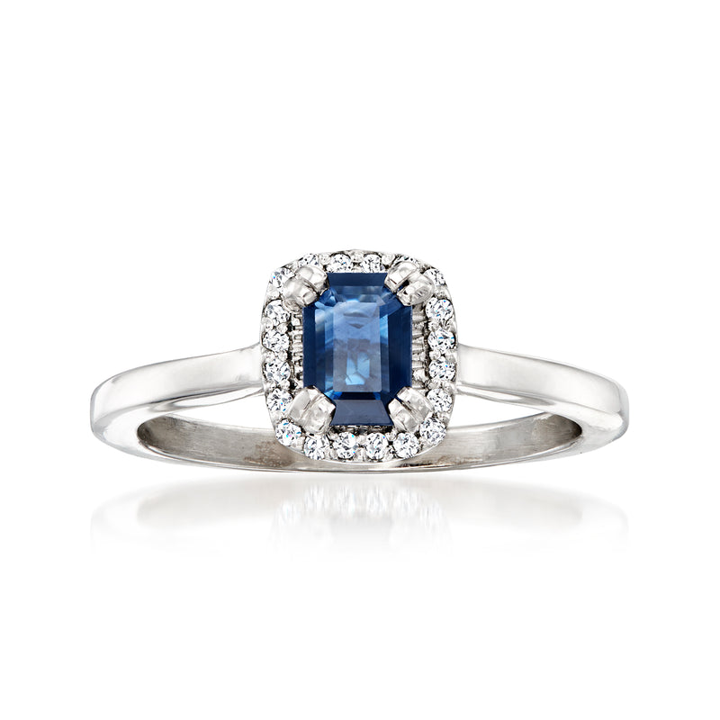 14kt white gold ring with blue cushion sapphire center and diamond halo