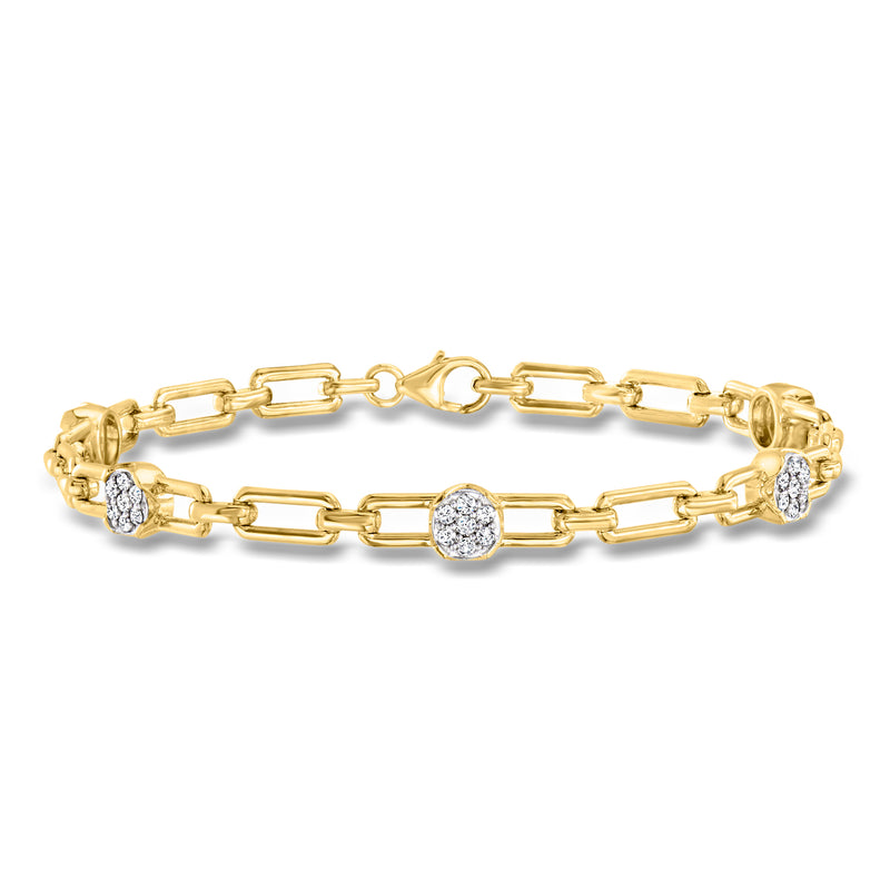 Gold-tone link bracelet with diamond cluster stations, round stones, toggle clasp