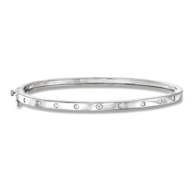 Sterling silver diamond station bangle bracelet with small round stones and hinge clasp