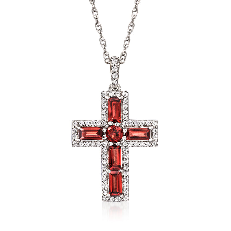 Sterling silver cross pendant necklace with red garnet center and white topaz halo accents