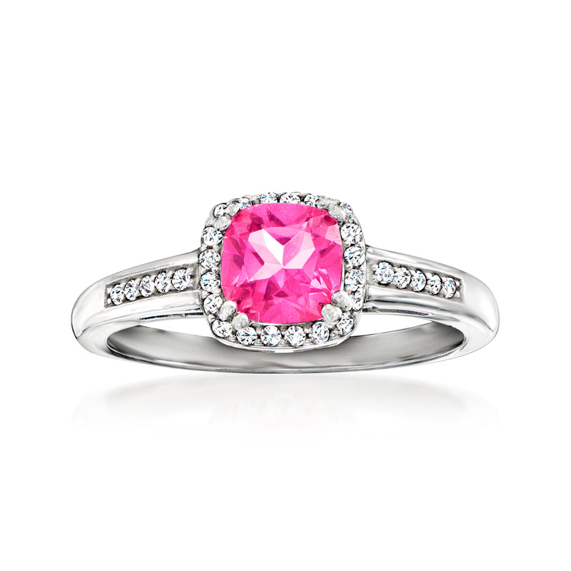 Sterling silver ring with pink topaz center stone, halo and white crystal accents