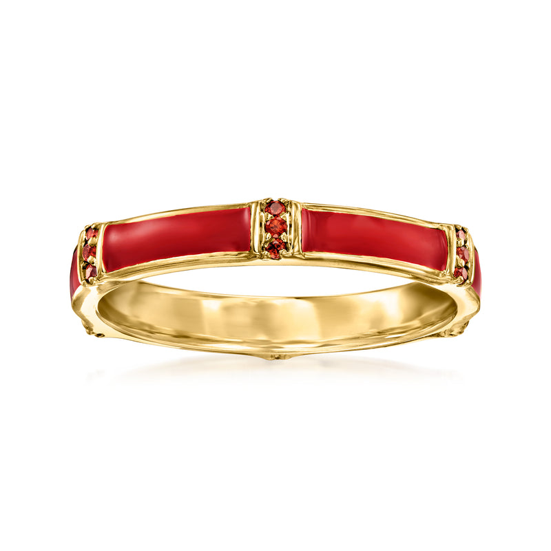 Gold-plated ring with red enamel band and small garnet accents