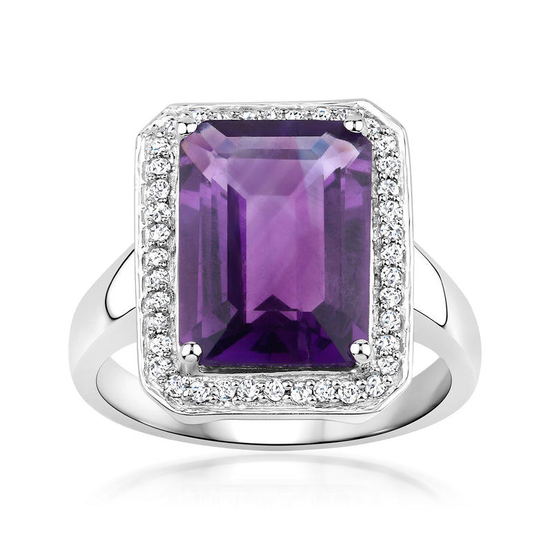 Sterling silver ring with faceted rectangular amethyst center and diamond halo