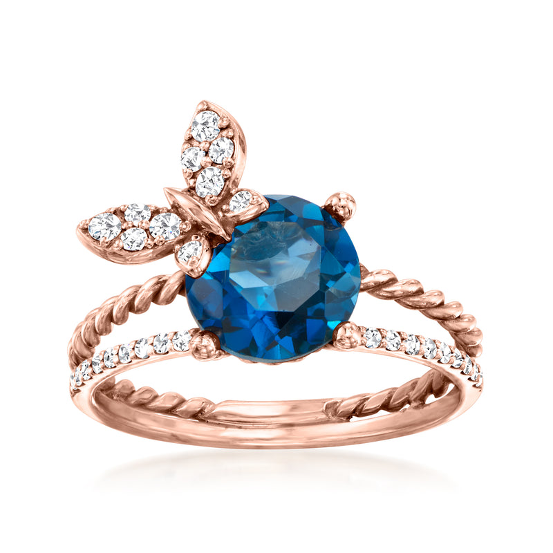 18kt rose gold butterfly ring with large blue London topaz and diamond accents