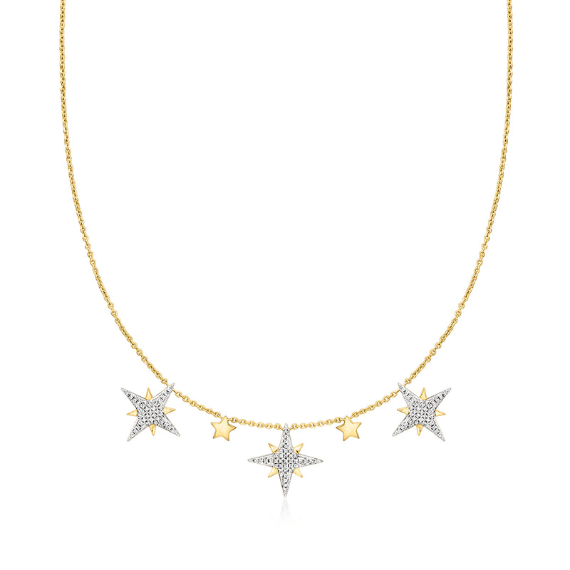 Gold starburst drop necklace with five diamond-look star pendants, delicate chain