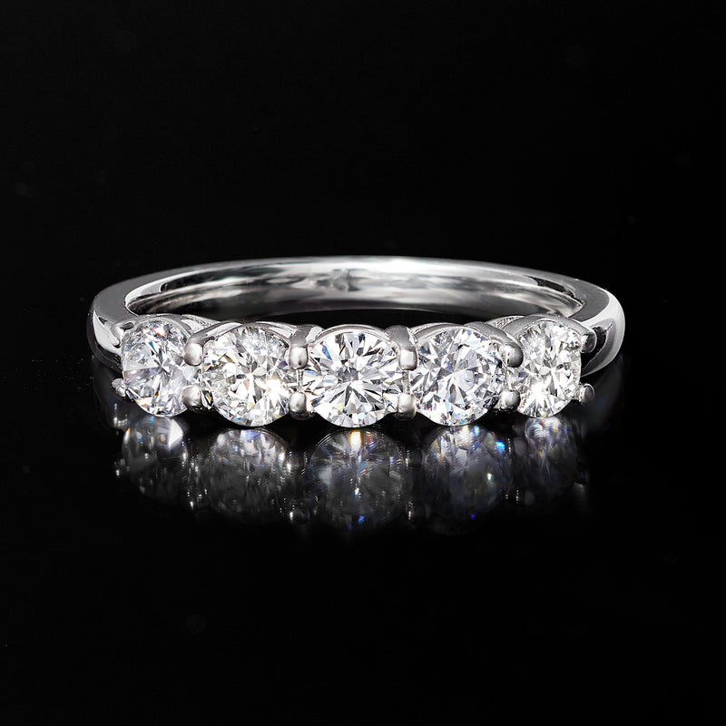 Five-stone diamond band in 14kt white gold with round stones in prong settings