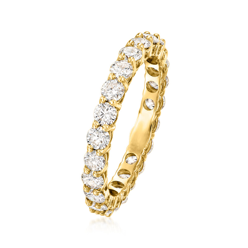 Side view: 14kt yellow gold eternity band with round prong-set diamonds