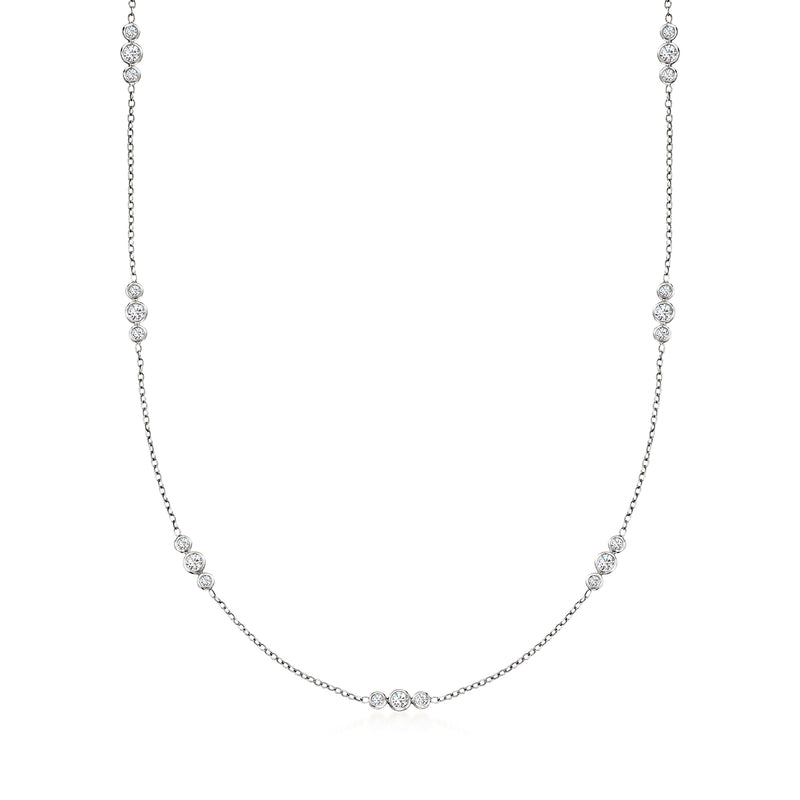 14kt white gold diamond station necklace with three round brilliant diamond clusters