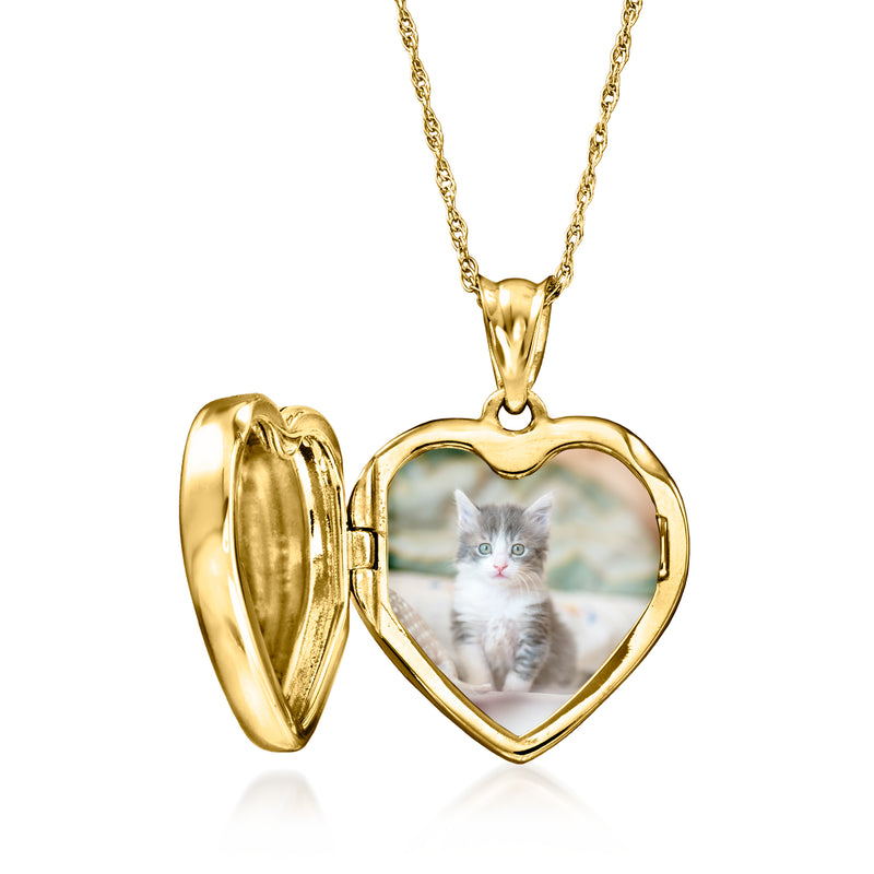 Yellow gold heart locket necklace opened to reveal a cat photo inside