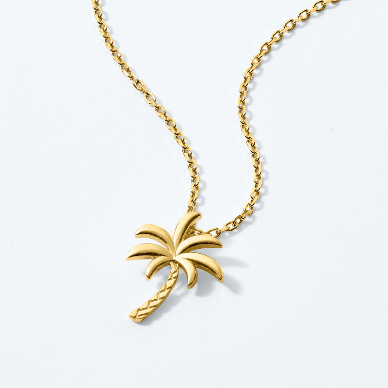 Gold palm tree and rope-trunk pendant necklace on link chain