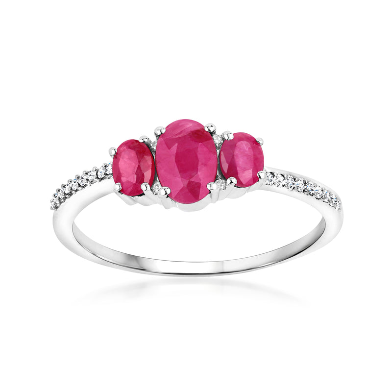 14kt white gold three-stone ruby ring with diamond accents, oval pink center and side stones