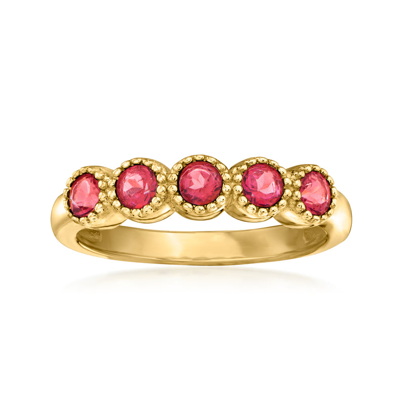 Five-stone pink topaz ring in gold over sterling, oval stones in a curved band