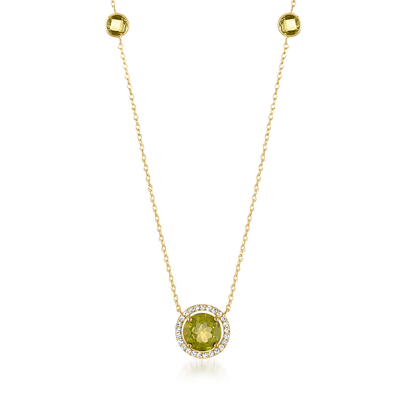 14kt yellow gold station necklace with round peridot pendant and diamond halo