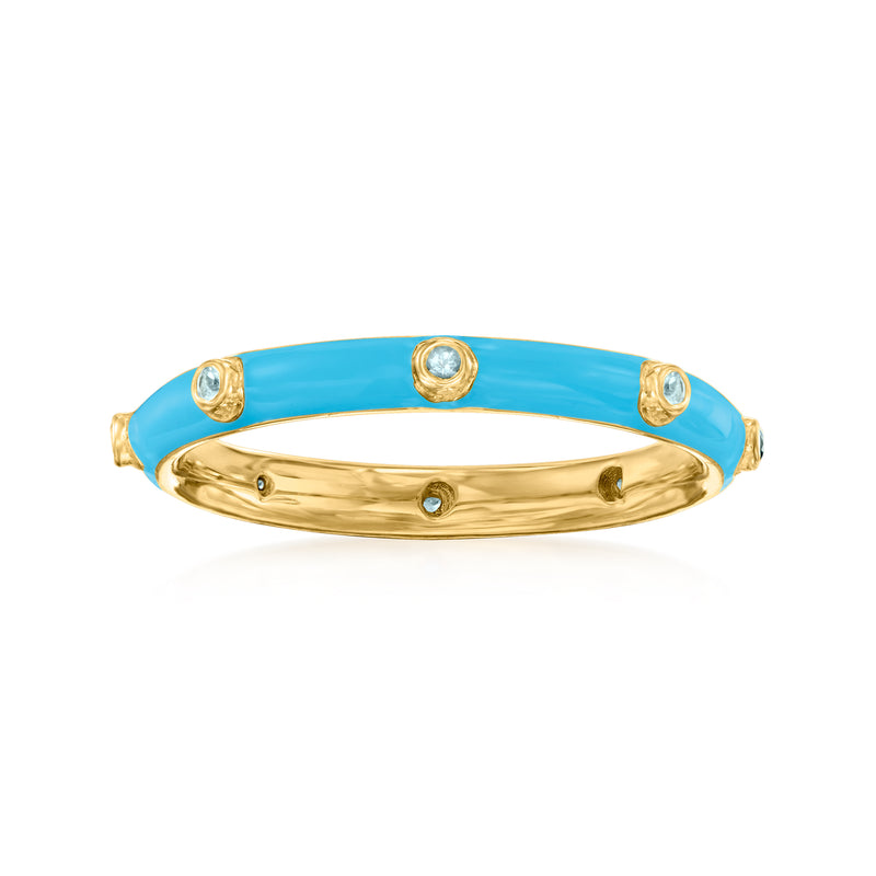 Turquoise enamel ring with round blue gemstone accents on gold-tone band