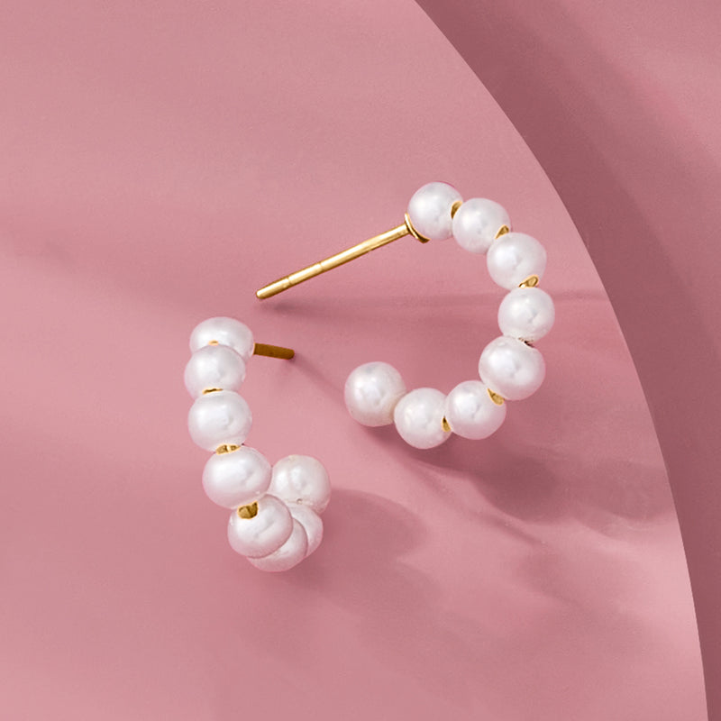 14kt yellow gold C-hoop earrings with white cultured pearl bead cluster, side angle