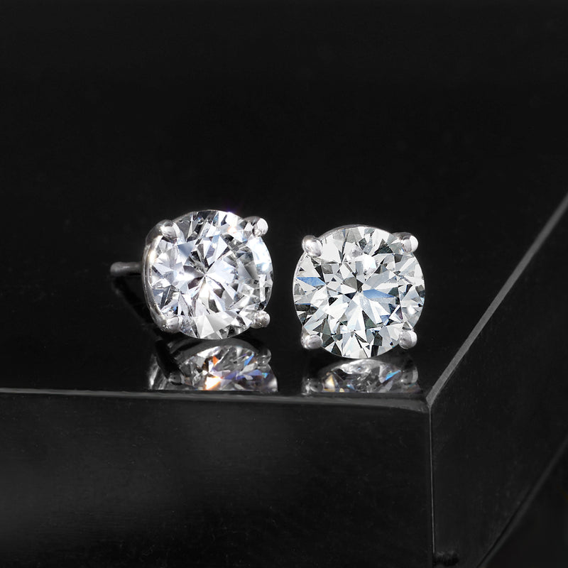 14kt white gold round diamond stud earrings with prong-set center stones
