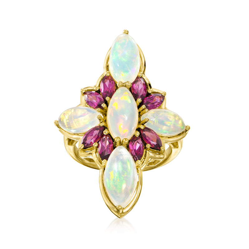 Gold-tone flower ring with oval opal center and pink rhodolite-style side stones