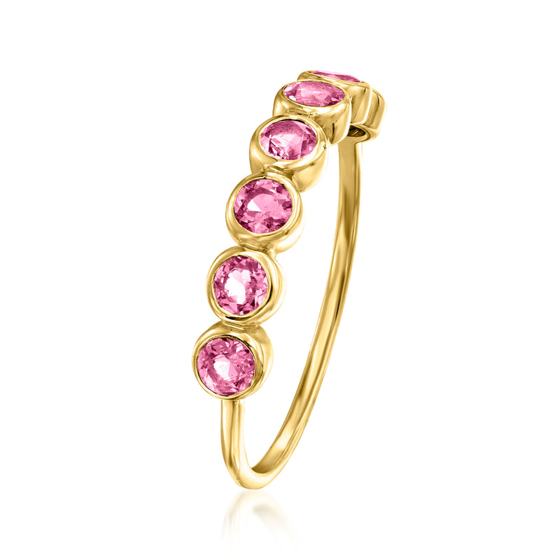 Yellow gold bezel-set pink tourmaline oval ring with five stones