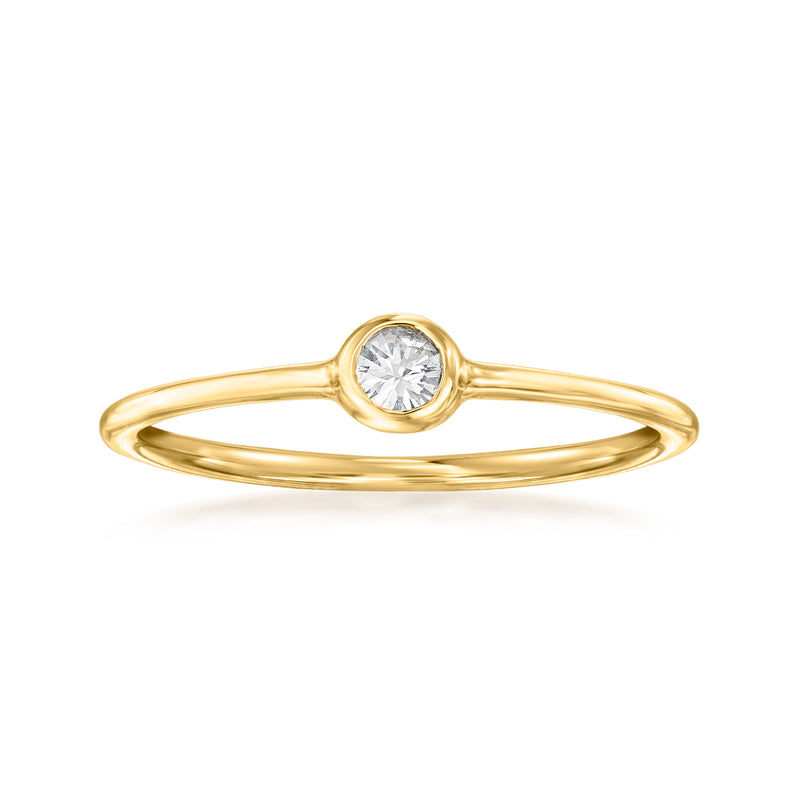 14k yellow gold ring with a round white sapphire center stone bezel