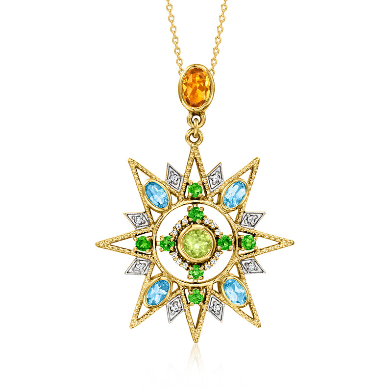 Gold starburst pendant necklace with green center, blue stones, and orange accent drop