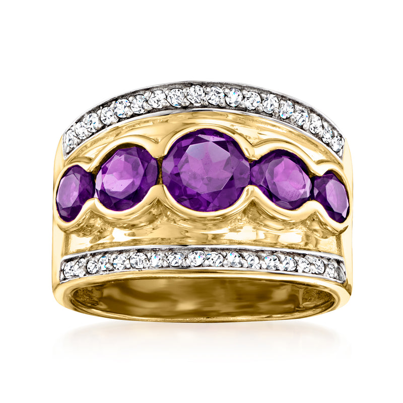 Gold ring with three purple amethyst stones and white zircon halo, scalloped band