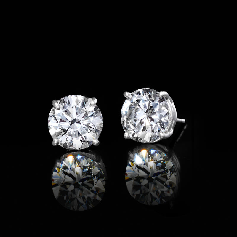 Round lab-grown diamond stud earrings in white gold, side view with posts