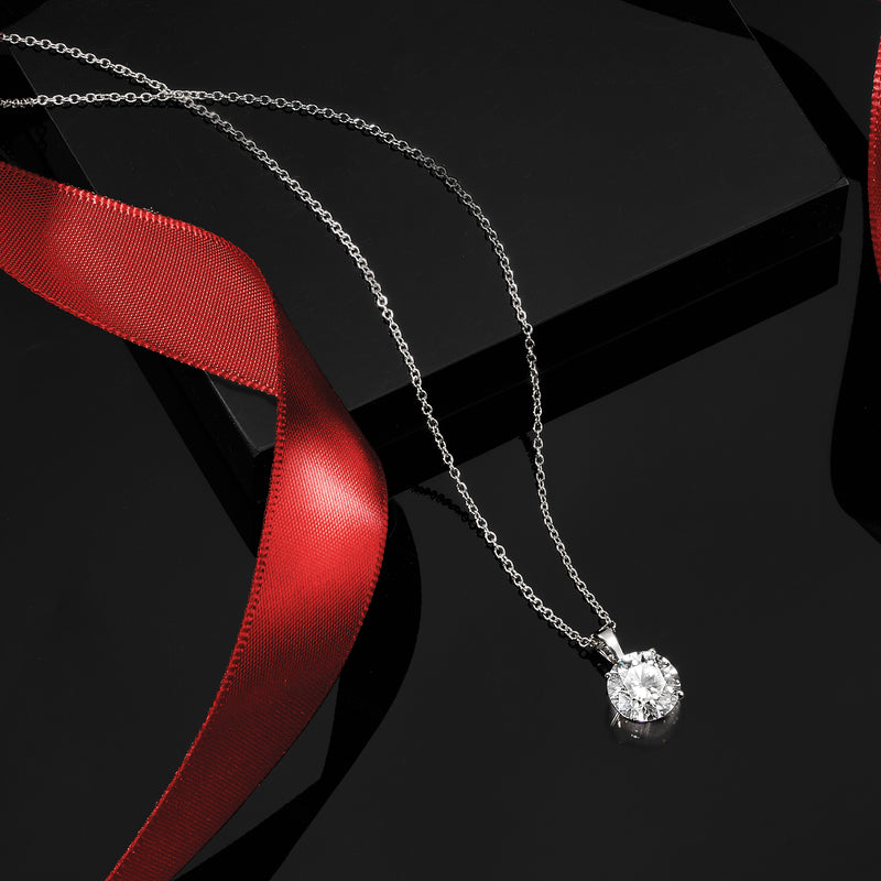 Single round diamond solitaire necklace with slender 14kt white gold chain